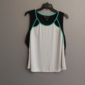Black white blouse with teal trim cutouts